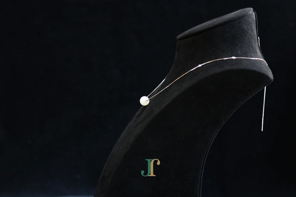GAIA Pure 10 · Suet White — nephrite jade bead necklace, on a display bust, side view