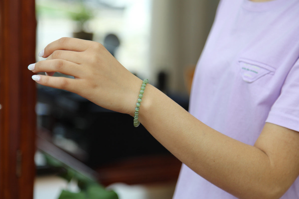 GAIA Earthy 6 · Cat's Eye — nephrite jade bead bracelet, on the wrist
