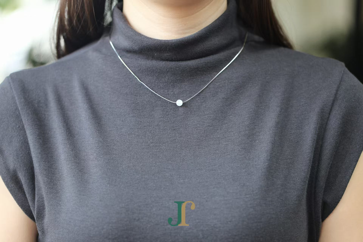 GAIA Pure 6 · Suet White — nephrite jade bead necklace, on the model