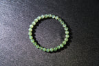 GAIA Earthy 6 · Cat's Eye — nephrite jade bead bracelet, on the model