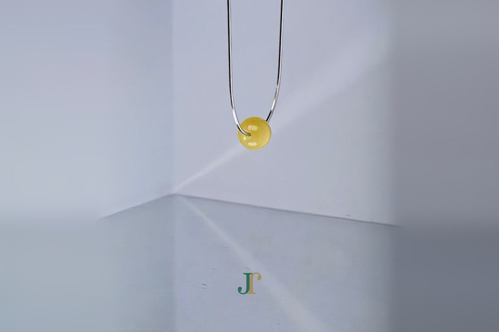 GAIA Pure 8 · Honey-Amber — nephrite jade bead necklace, hanging