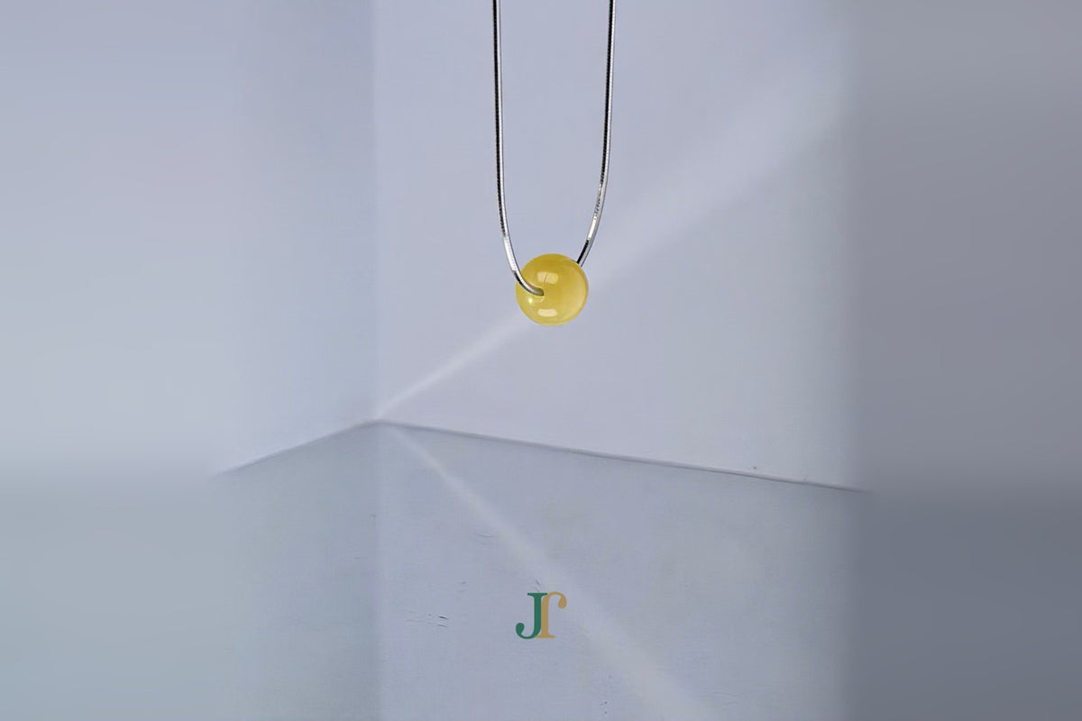 GAIA Pure 8 · Honey-Amber — nephrite jade bead necklace, hanging