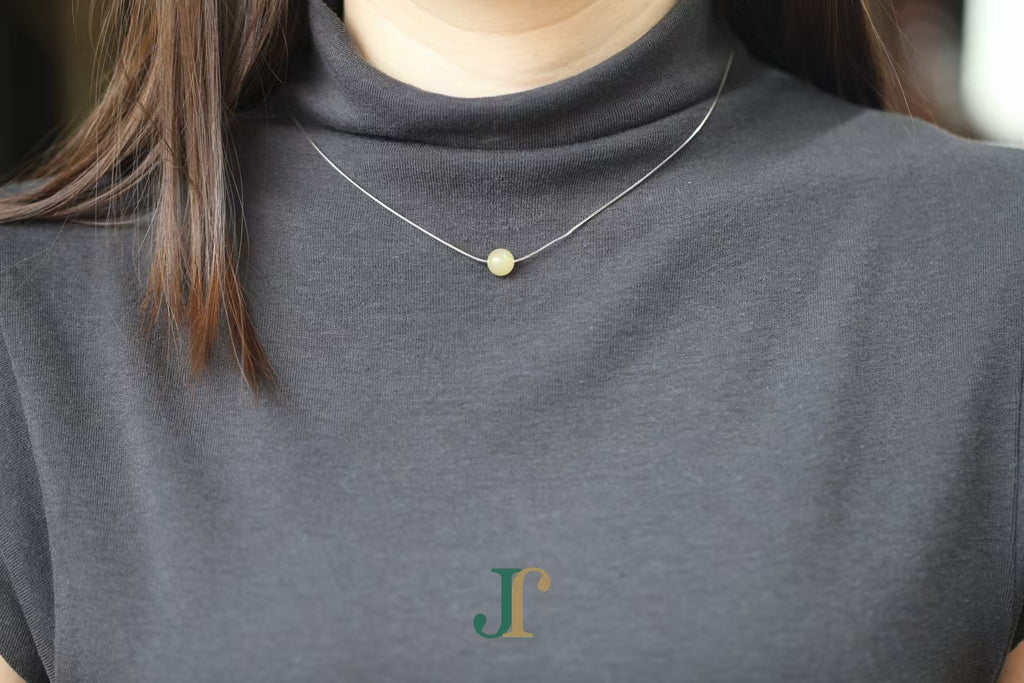 GAIA Pure 8 · Honey-Amber — nephrite jade bead necklace, on the model