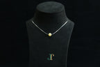 GAIA Pure 8 · Honey-Amber — nephrite jade bead necklace, on a display bust