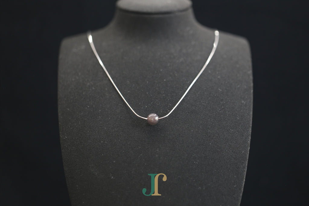 GAIA Pure 8 · Smoky Lilac — nephrite jade bead necklace, on a display bust