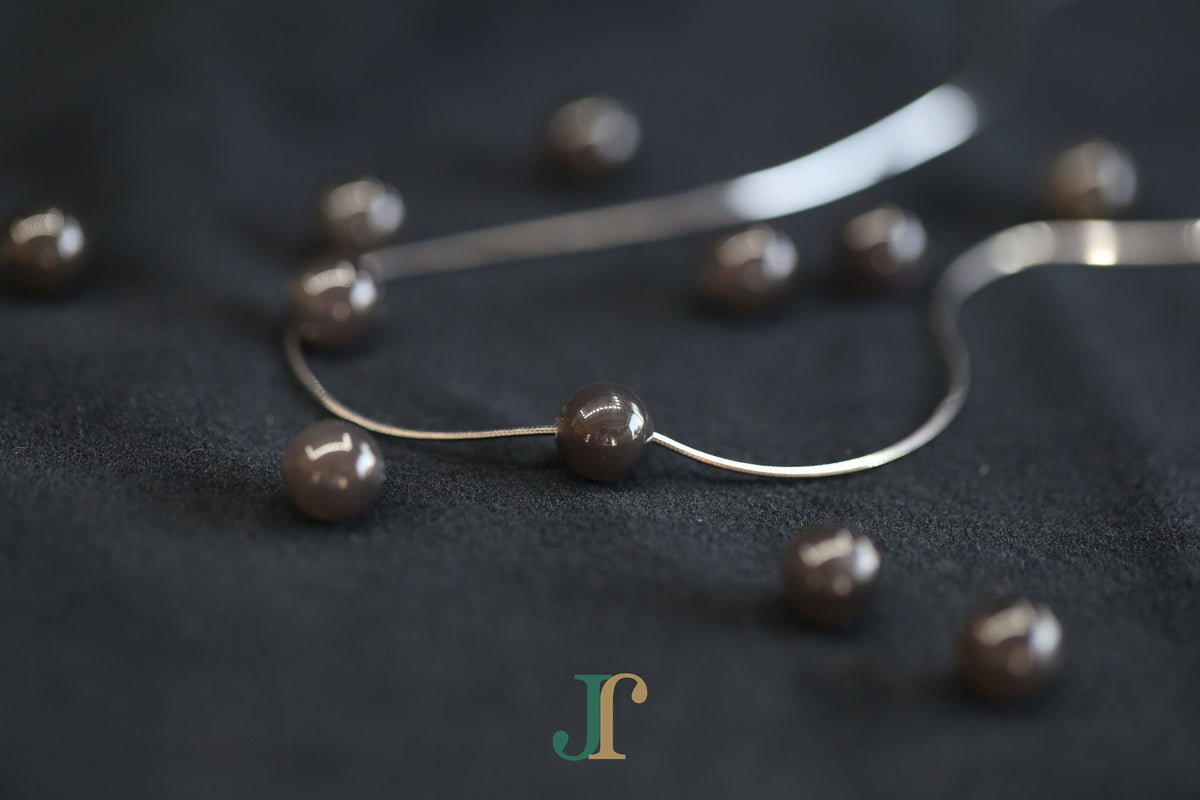 GAIA Pure 8 · Smoky Lilac — nephrite jade bead necklace, on the chain, second view
