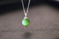 GAIA Serenity · Cat's Eye — nephrite jade pendant, front