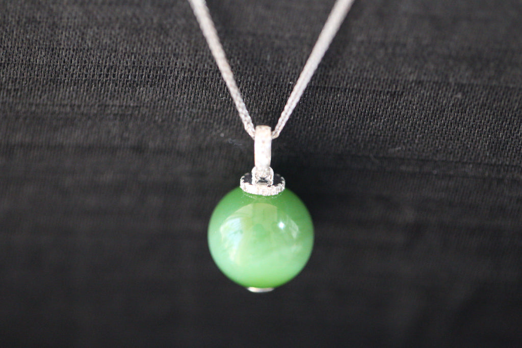 GAIA Serenity · Cat's Eye — nephrite jade pendant, metal detail