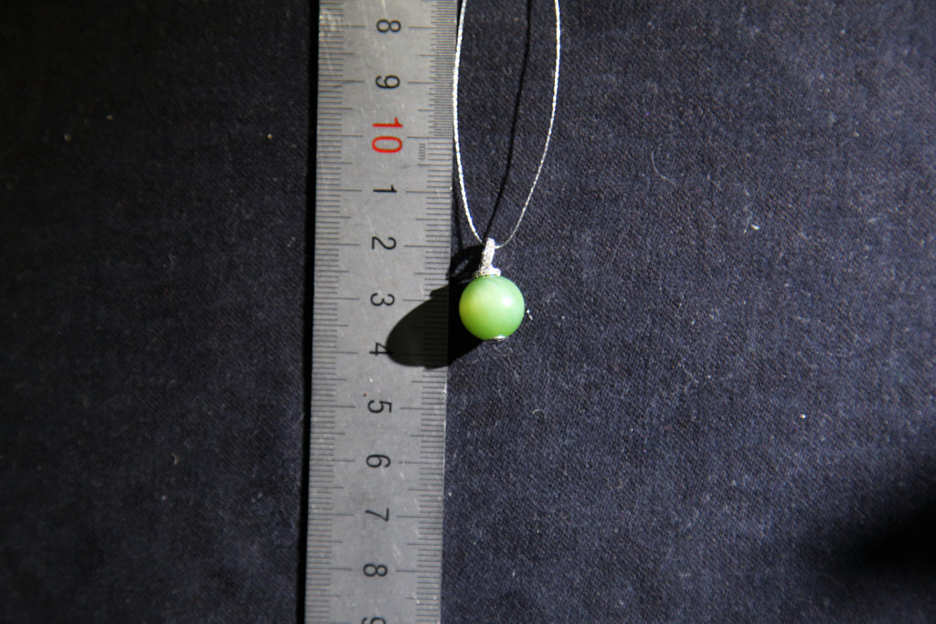 GAIA Serenity · Cat's Eye — nephrite jade pendant, size reference