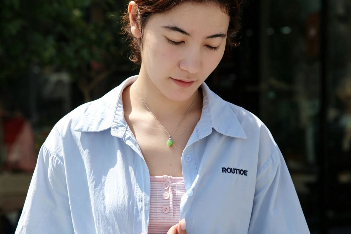 GAIA Serenity · Cat's Eye — nephrite jade pendant, worn
