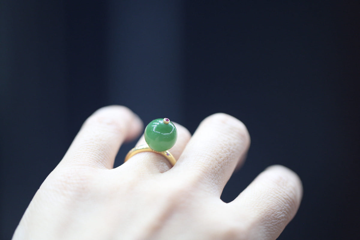 GAIA Spirit 12 · Willow Green — nephrite jade ring, on the model