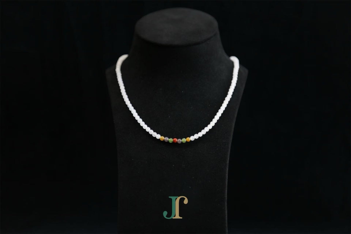 GAIA Strand 4 · Multi-Colour — nephrite jade bead necklace, on a display bust