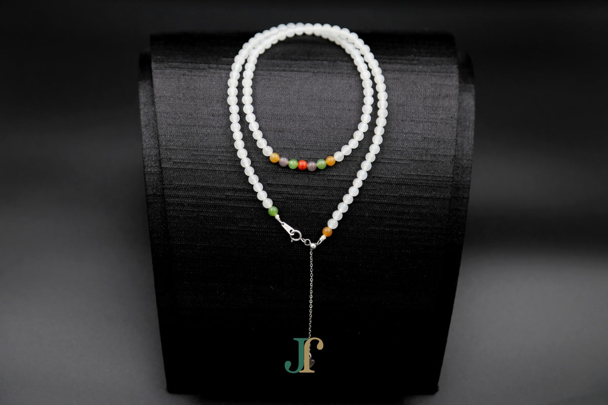 GAIA Strand 4 · Multi-Colour — nephrite jade bead necklace, on a display stand