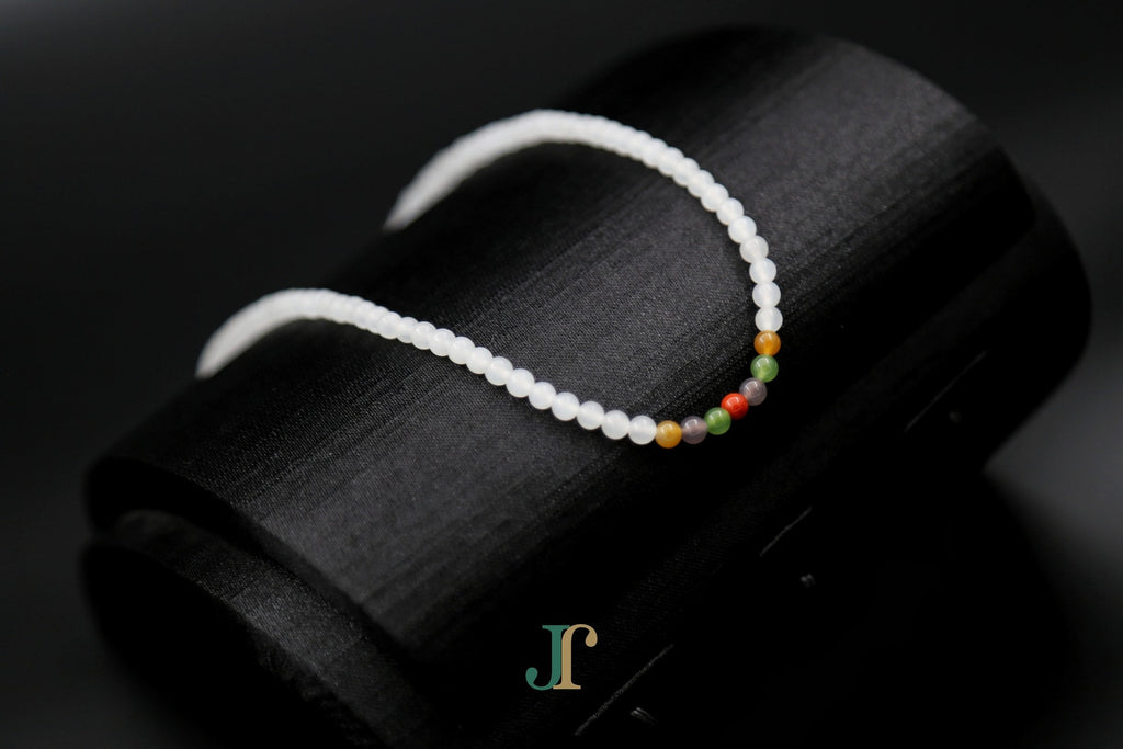 GAIA Strand 4 · Multi-Colour — nephrite jade bead necklace, detail of the coloured beads