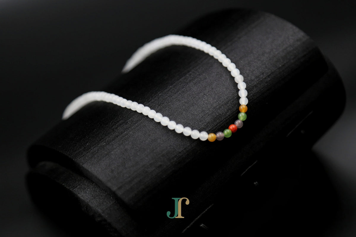 GAIA Strand 4 · Multi-Colour — nephrite jade bead necklace, detail of the coloured beads