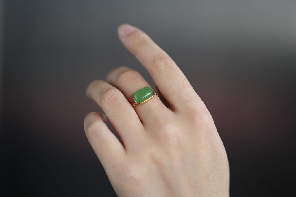GALET 001 · Willow Green — nephrite jade ring, on the model