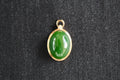 GALET 010 · Spinach Green — nephrite jade pendant, front