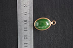 GALET 010 · Spinach Green — nephrite jade pendant, detail