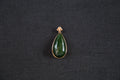 GALET 011 · Spinach Green — nephrite jade pendant, front