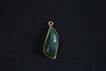 GALET 012 · Spinach Green — nephrite jade pendant, front