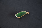 GALET 012 · Spinach Green — nephrite jade pendant, close view