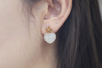 GALET 016 · Lotus Pink — nephrite jade earrings, on the model