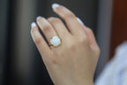 GALET 017 · Suet White — nephrite jade ring, on the model