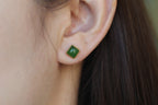 GALET 022 · Spinach Green — nephrite jade earrings, on the model