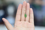 GALET 032 · Willow Green — nephrite jade necklace, in the hand