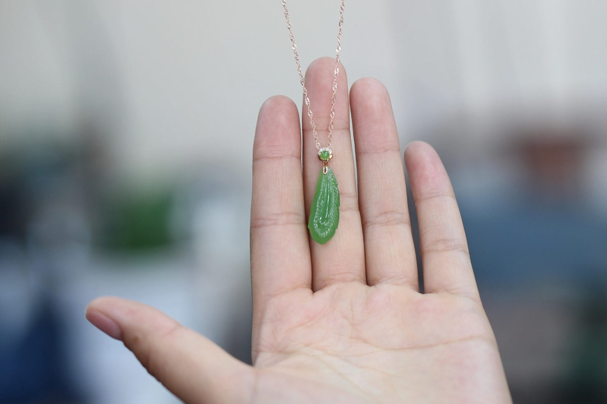 GALET 033 · Willow Green — nephrite jade pendant, in the hand