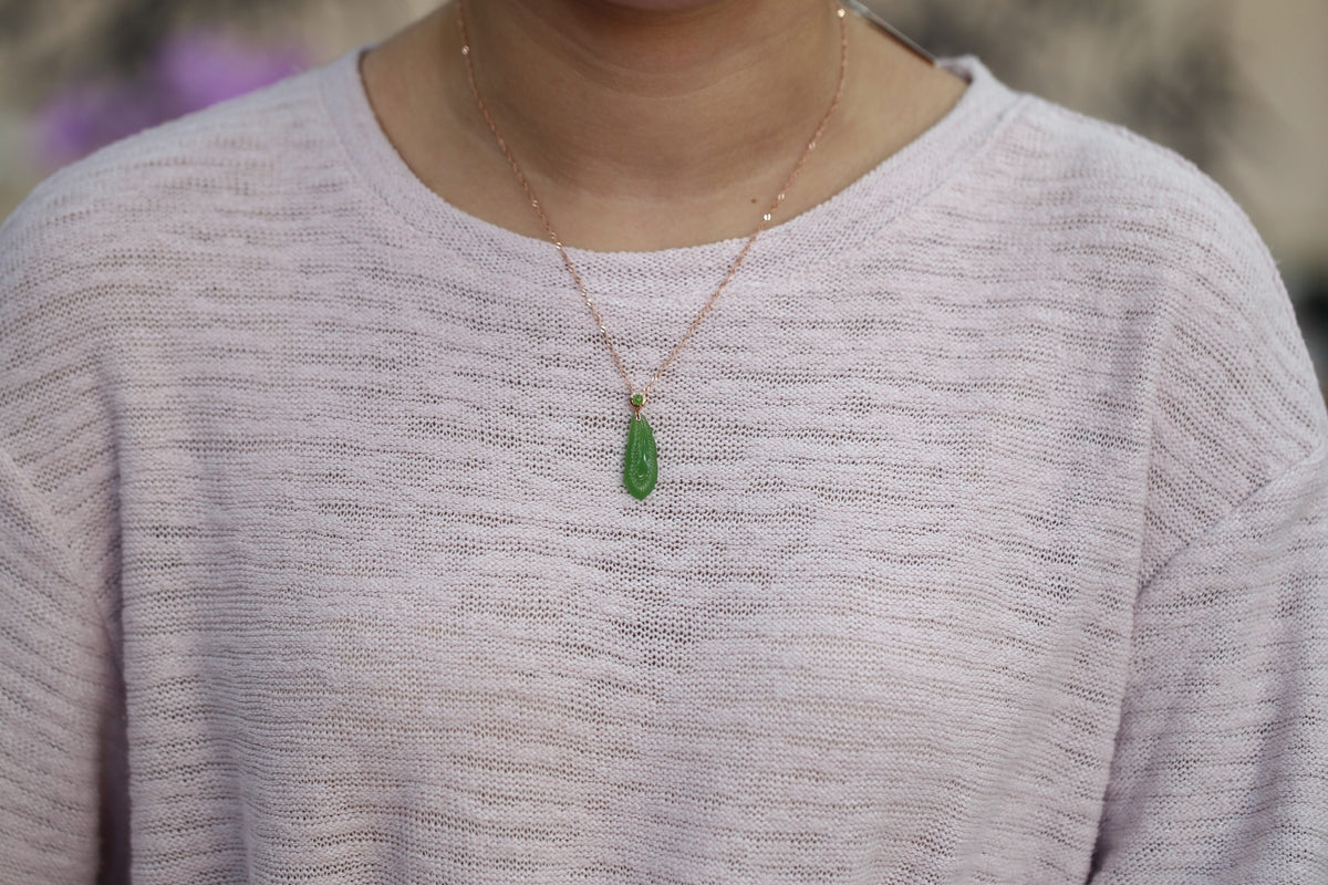 GALET 033 · Willow Green — nephrite jade pendant, on the model, close