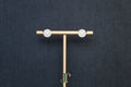 GALET 034 · Suet White — nephrite jade earrings, on a display stand