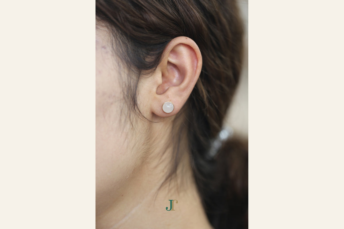 GALET 034 · Suet White — nephrite jade earrings, on the model