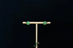 GALET 035 · Willow Green — nephrite jade earrings, on a display stand