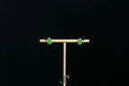GALET 036 · Willow Green — nephrite jade earrings, on a display stand