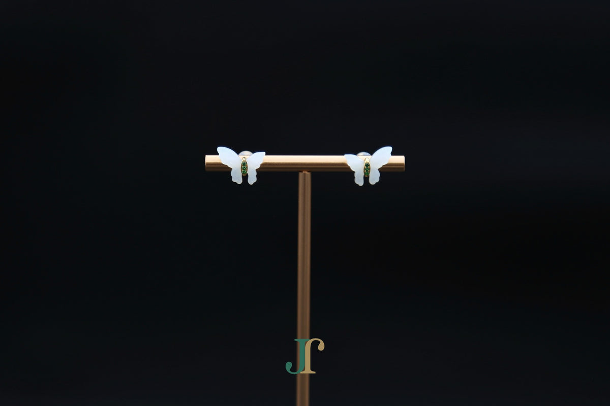 GALET 037 · Suet White — nephrite jade earrings, on a display stand