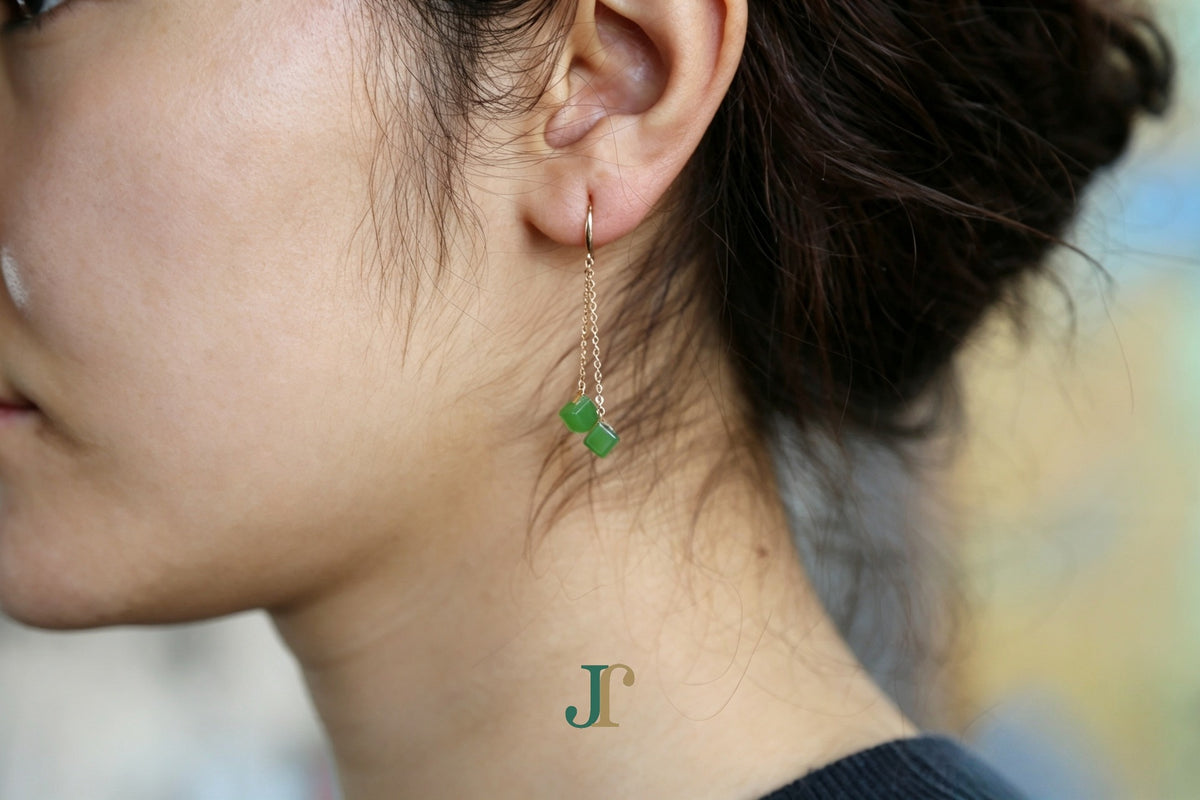 GALET 038 · Willow Green — nephrite jade earrings, on the ear