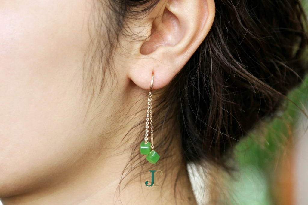 GALET 038 · Willow Green — nephrite jade earrings, on the ear, second view