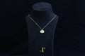 GALET 039 · Golden Green — nephrite jade necklace, on a display bust