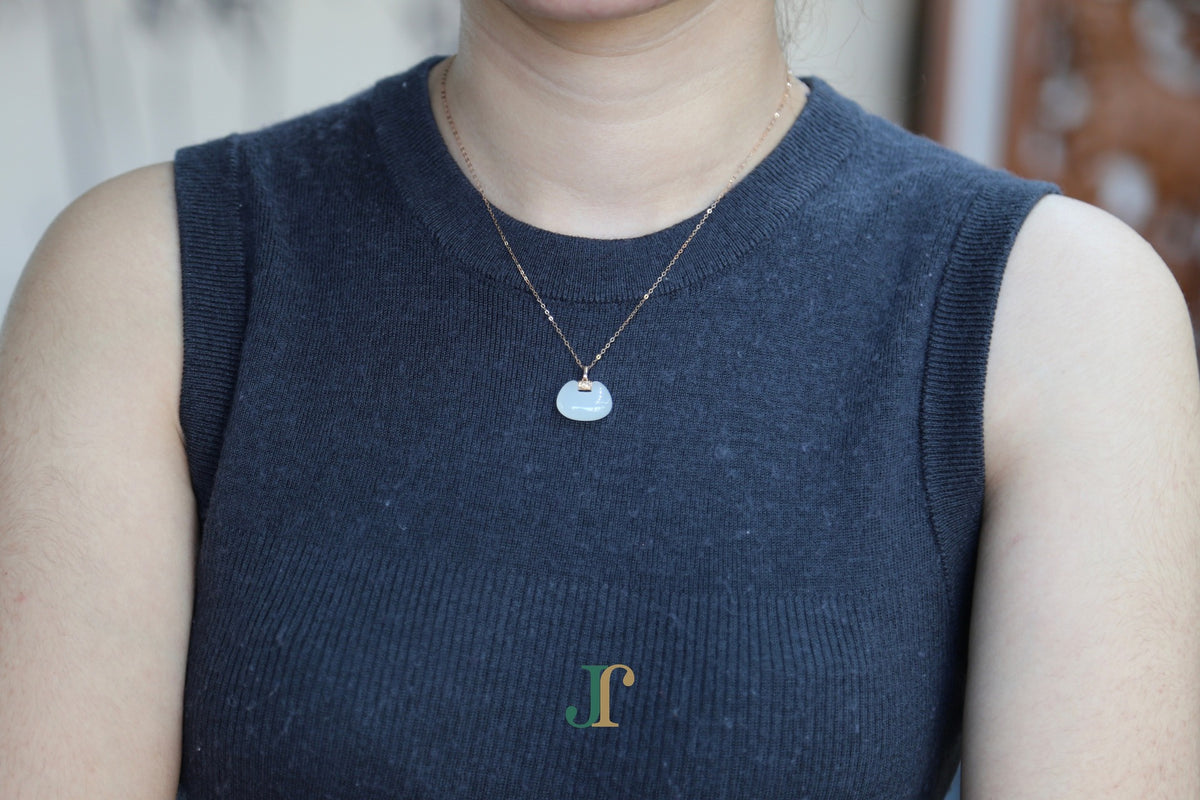 GALET 040 · Suet White — nephrite jade necklace, worn
