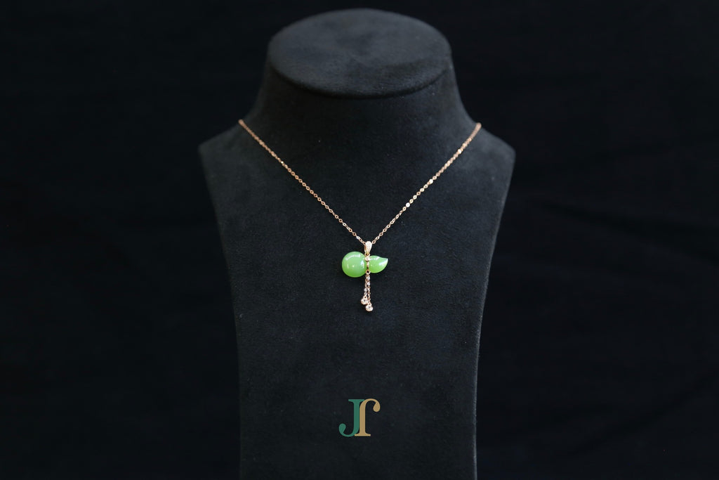 GALET 041 · Willow Green — nephrite jade necklace, on a display bust