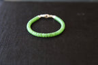 PASTILLE Disc 6×3.5 · Willow Green — nephrite jade pastille bracelet, detail