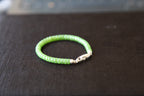 PASTILLE Disc 6×3.5 · Willow Green — nephrite jade pastille bracelet, on the model