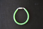 PASTILLE Disc 6×3.5 · Willow Green — nephrite jade pastille bracelet, front