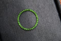 PILLAR Pill 6×5 · Spinach Green — nephrite jade cylinder bracelet, front