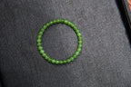 PILLAR Pill 6×5 · Spinach Green — nephrite jade cylinder bracelet, front