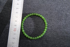 PILLAR Pill 6×5 · Spinach Green — nephrite jade cylinder bracelet, size reference