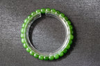 PILLAR Pill 7×6 · Willow Green — nephrite jade cylinder bracelet, close view