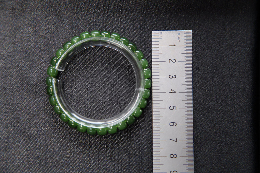 PILLAR Pill 7×6 · Willow Green — nephrite jade cylinder bracelet, size reference