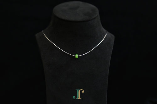 PASTILLE Pure 6×3 · Willow Green — nephrite jade pastille necklace, on a display bust